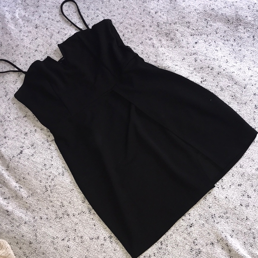 (A little revealing;) little black dress